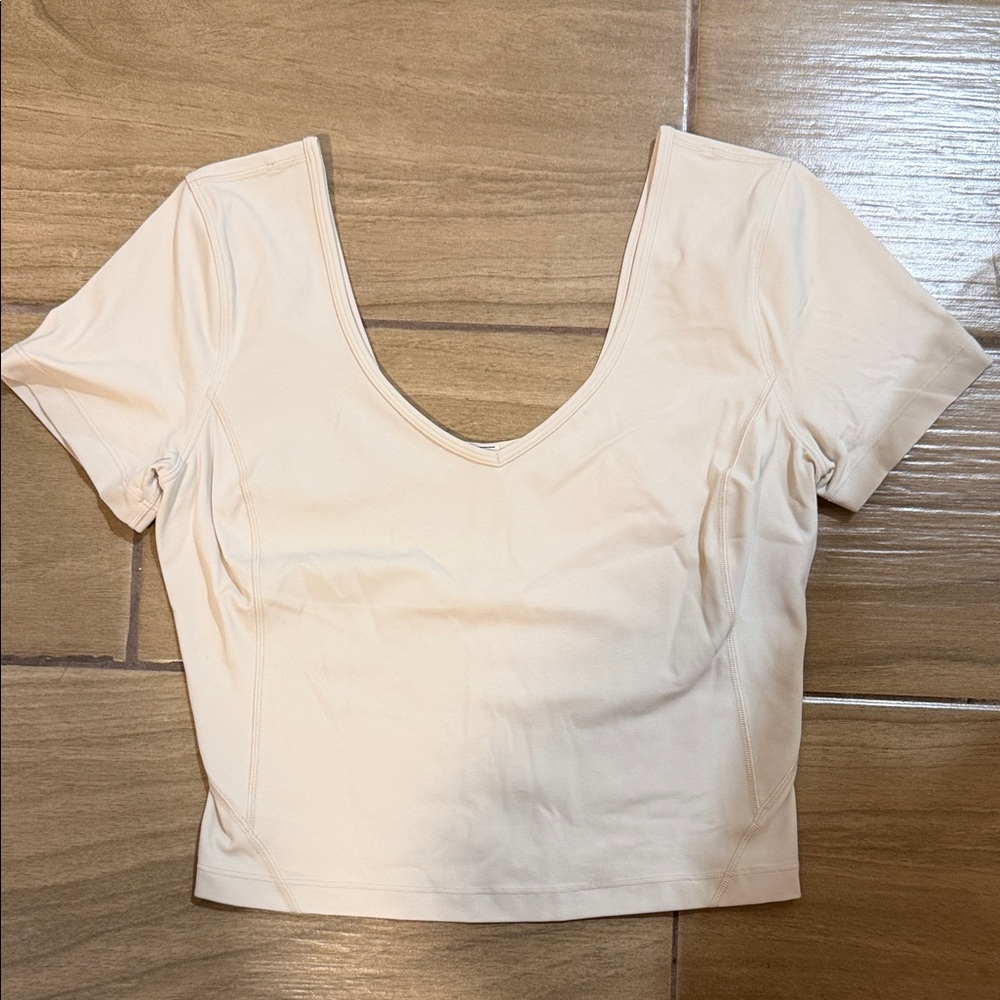 lululemon athletica V-Neck Short Sleeve Crop Top in cream